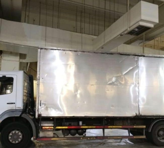 A 24ft tailgate box lorry seen from the side
