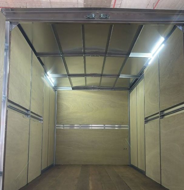 The empty cargo area of a 15ft box lorry